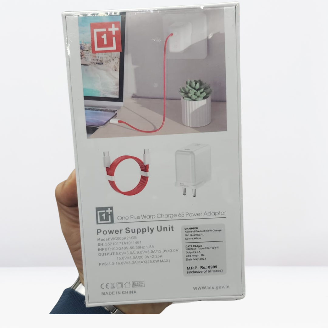 One-Plus 65W Warp Fast Charger with C to C Cable.
